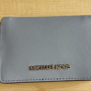 MICHAEL Michael Korda Pale Blue Leather Jet Slim Bifold Wallet